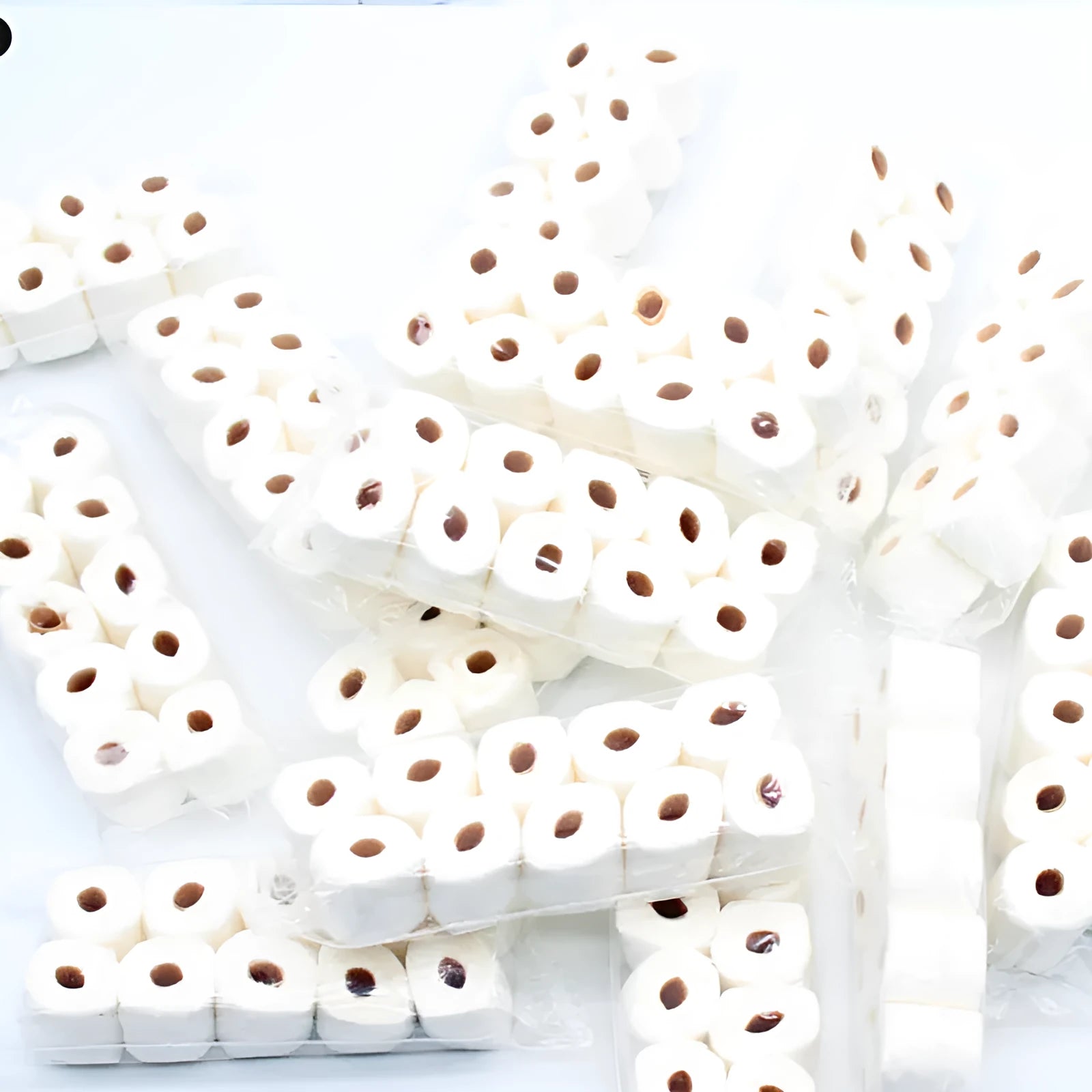 Miniature paper tissue roll model measuring 30mm wide by 15mm deep by 80mm high