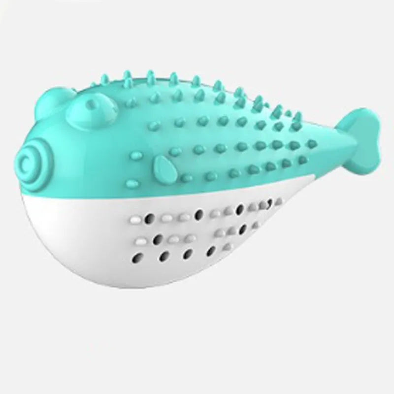 Mint Toys blue silicone cat fish chew toy and teaser on a plain surface showing fish shape and size.