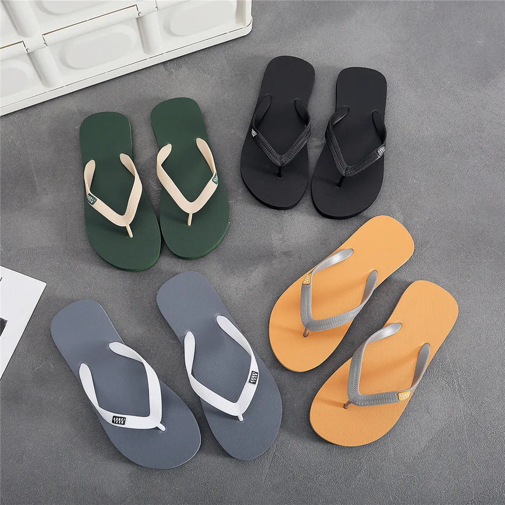 Men's black flip-flops with a textured rubber sole and lightweight EVA upper.