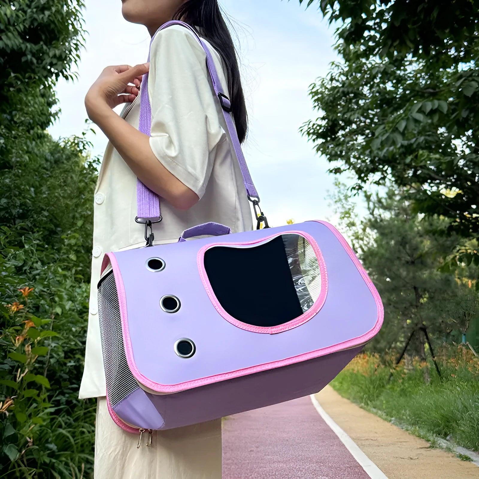 Medium capacity pet crossbody bag in Oxford cloth shown in various solid colour options