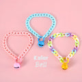 A macaron candy coloured plastic pet collar with chain detailing, shown in blue, pink, and mixed colour options.