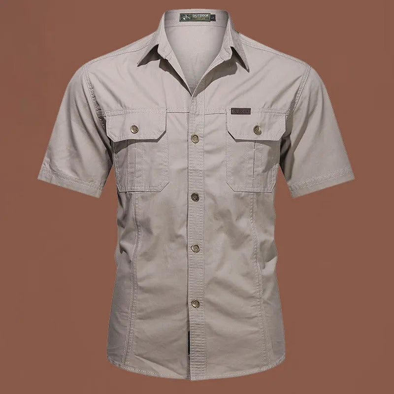 Men's army green cotton work shirt with short sleeves and a cardigan style, laid flat.