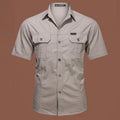 Men's army green cotton work shirt with short sleeves and a cardigan style, laid flat.