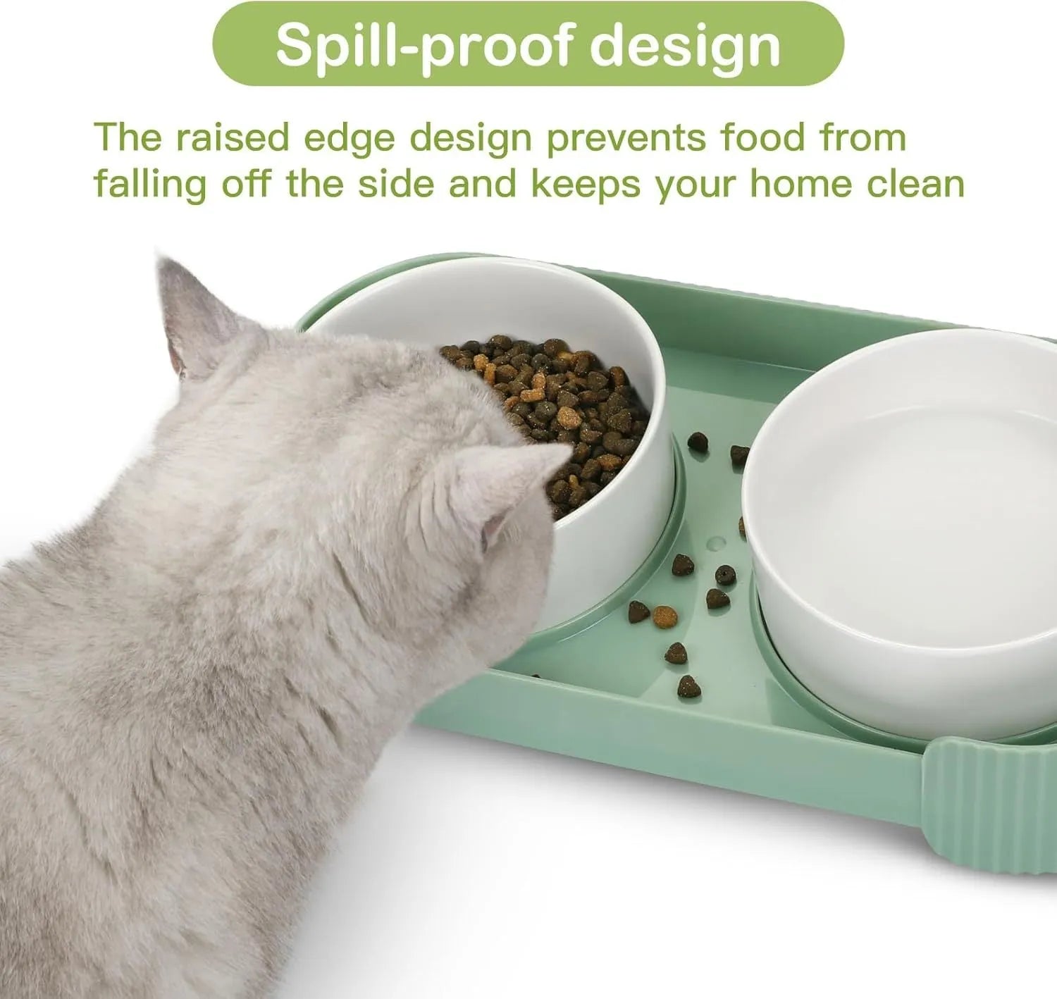 Green ceramic elevated cat bowl set with two tilted dishes on a non-slip stand.