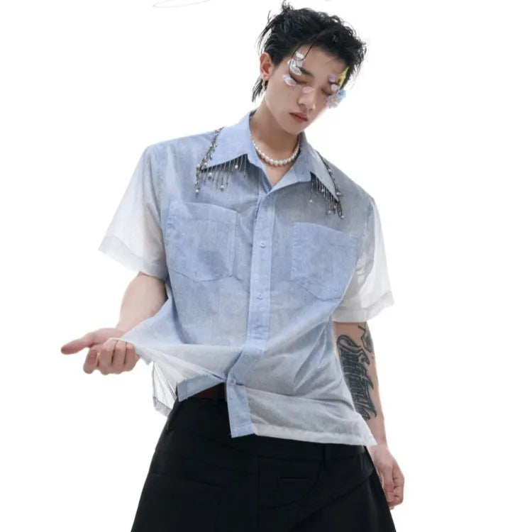 Blue and white gradient loose fit short sleeve shirt on a hanger