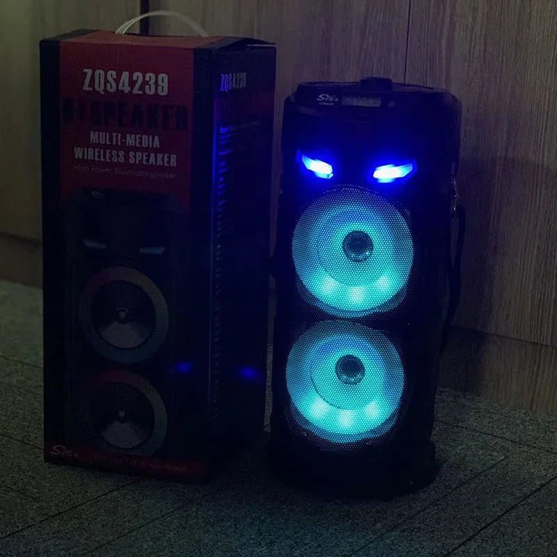 Black portable Bluetooth speaker with dual horn cannon design and USB charging port
