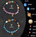 Two natural stone beaded bracelets with different zodiac sign designs laid flat.