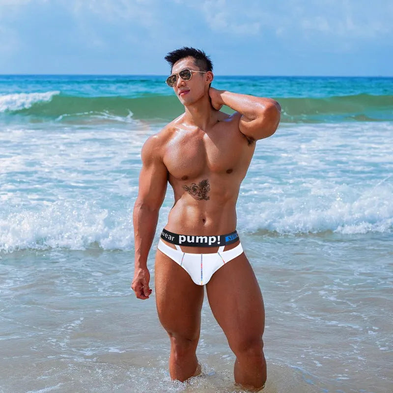 Men's solid black modal briefs with low waist design laid flat