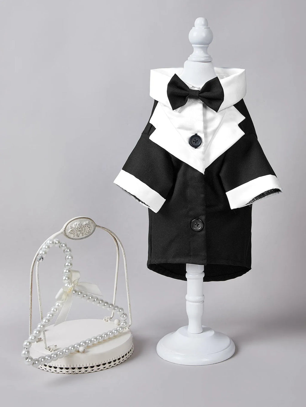 Chinese-style four-legged polyester wedding suit for a dog or cat in black.