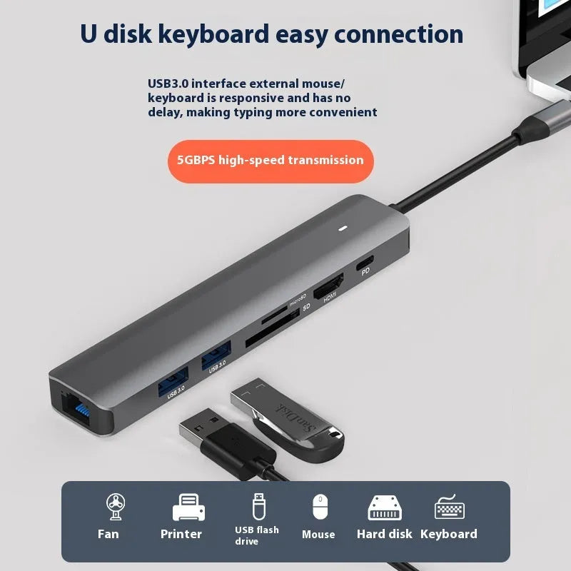 LQT-LH07 7-in-1 USB-C PD computer hub and card reader on a desk.