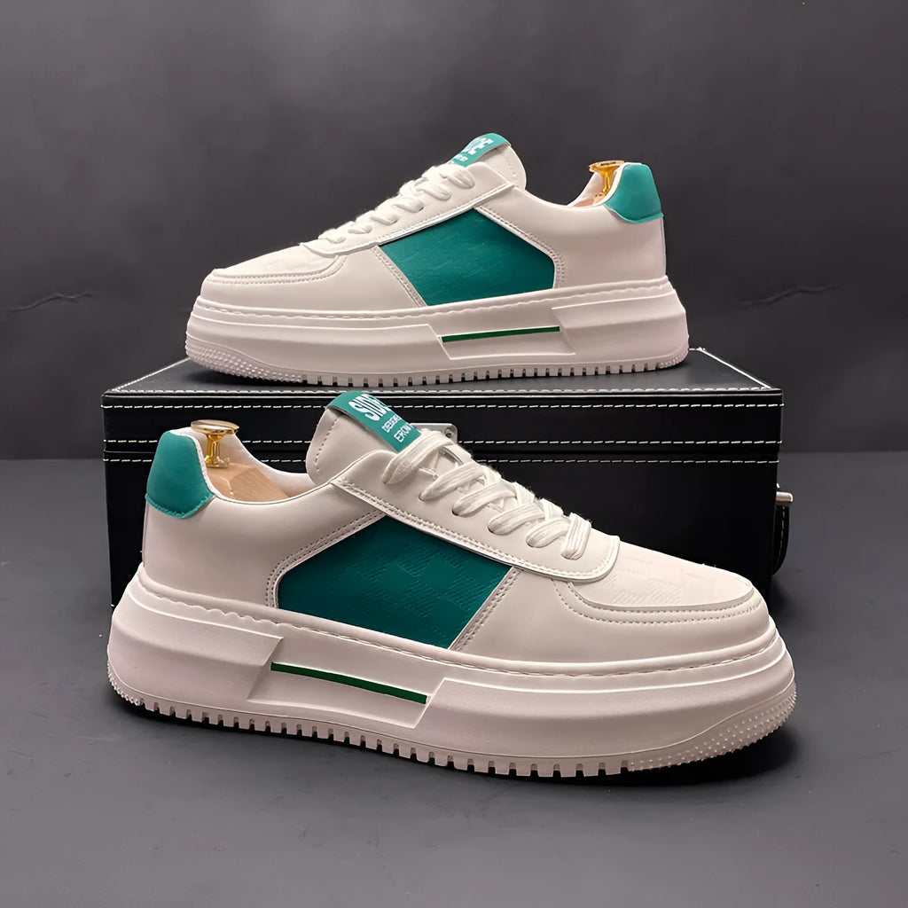 Unisex green and white sports casual shoes with cloth upper and rubber foam sole.
