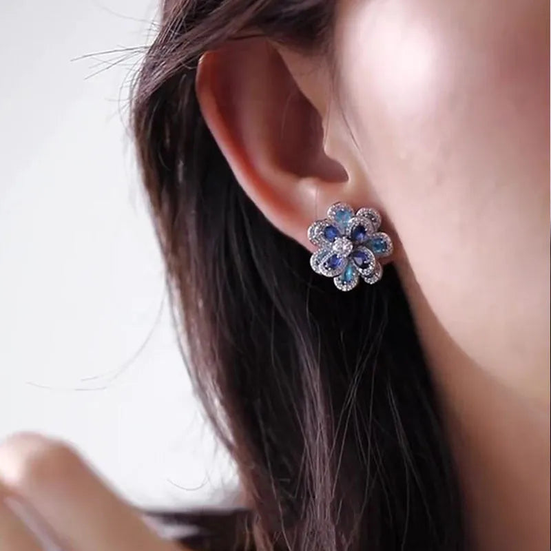 Blue flower stud earrings for women with shiny diamond detailing and zinc alloy electroplated construction