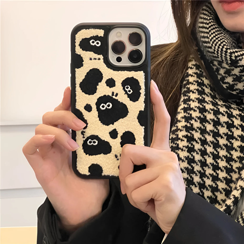 Black plush soft fairy design phone case for iPhone models.