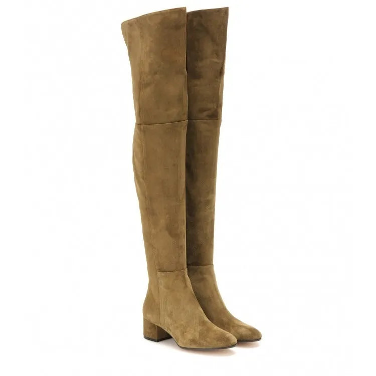Grey suede women's over the knee flat boots with a pointed toe and thick low heel on a neutral background.