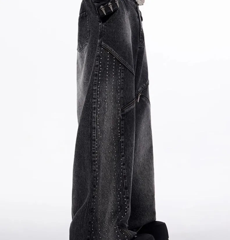 Black and grey washed denim wide leg trousers and vest set on a hanger
