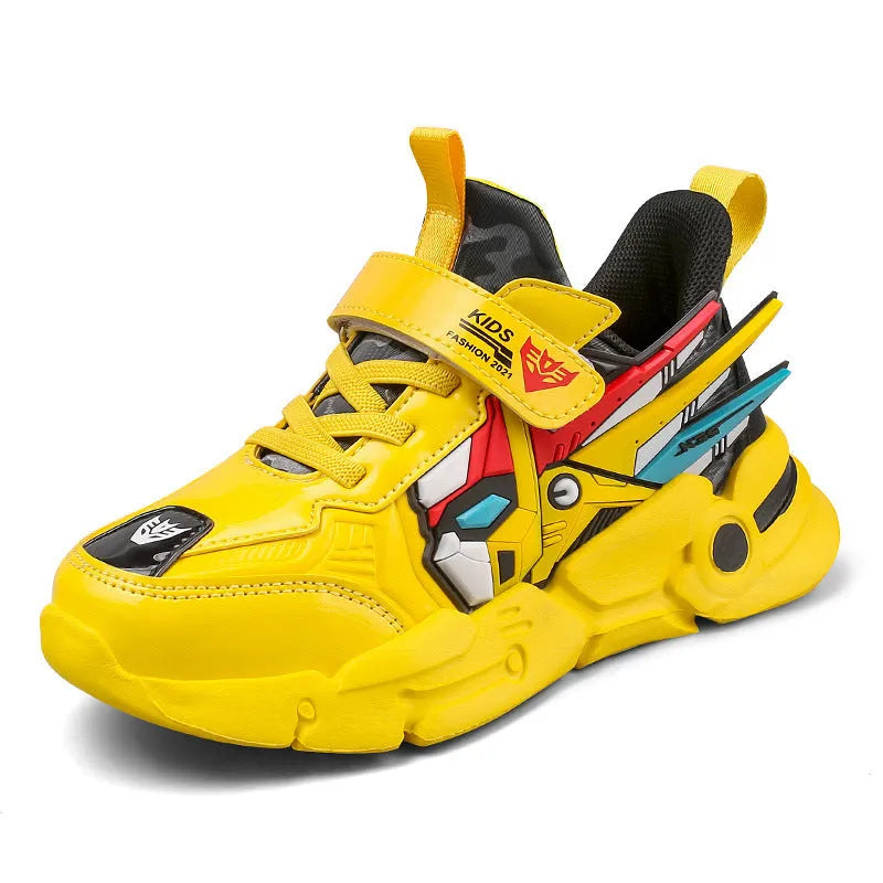 Boy's yellow artificial leather running shoes with Velcro strap and cartoon pattern, shown on a rubber sole.