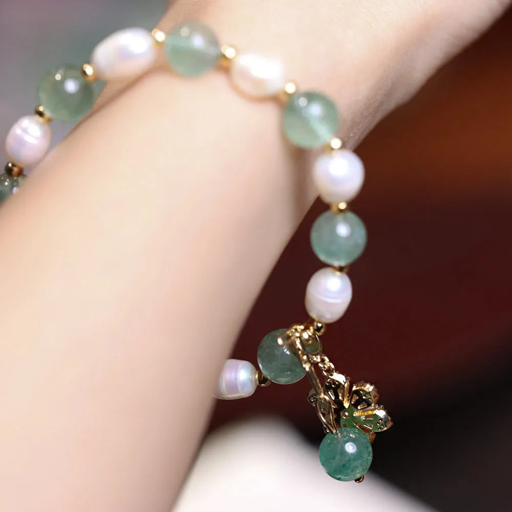 Green freshwater strawberry pearl bracelet with Chinese knot and peace buckle closure