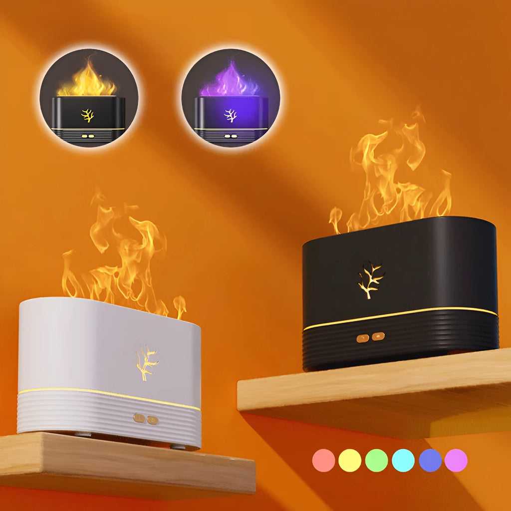 Black square USB aroma diffuser with LED flame light effect and mist output on a wooden table.