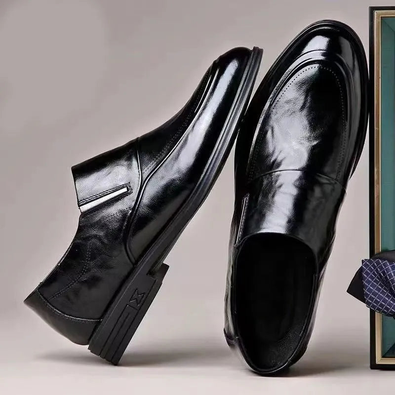 Business formal slip-on shoes with pointed toe, PU upper, rubber sole, and decorative metal and embossed details
