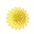 Yellow sunflower-shaped rubber dog chew toy with squeaker