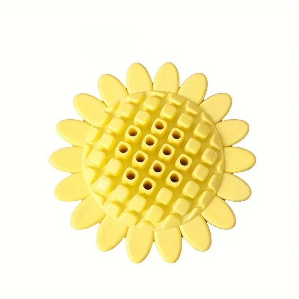 Yellow sunflower-shaped rubber dog chew toy with squeaker