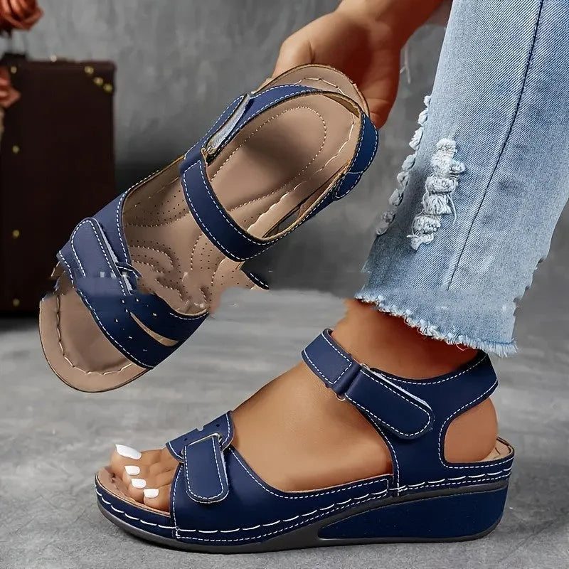 Beige plus size strap sandals with a thick composite sole and adjustable Velcro fastening on a white background