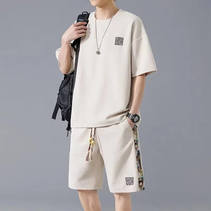 Waffle embroidery two-piece set with short sleeve top and shorts in thin polyester, summer sports style, sizes M-5XL