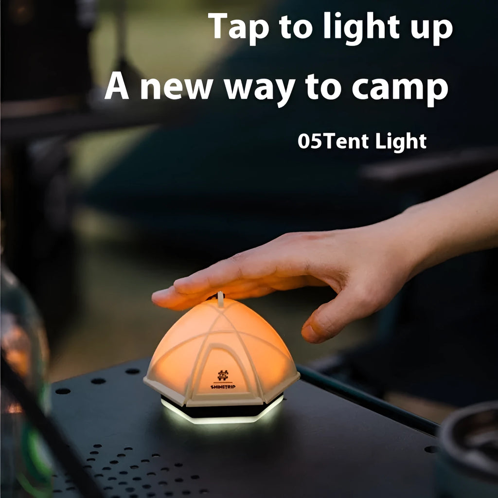 Analog adjustable camping tent light in dark green colour showing brightness control dial