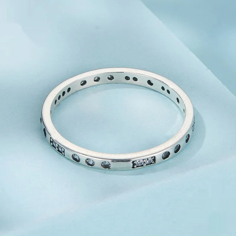 Moss Password I Love You silver-toned ring with oxidised black finish on a hand
