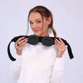 Grey outline Bluetooth sleeping eye mask with adjustable head strap on neutral background