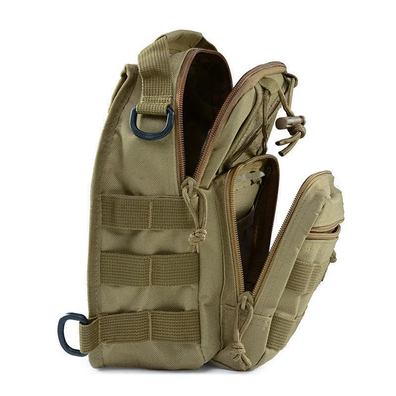 Small green camouflage tactical backpack with MOLLE webbing on front, carried crossbody.