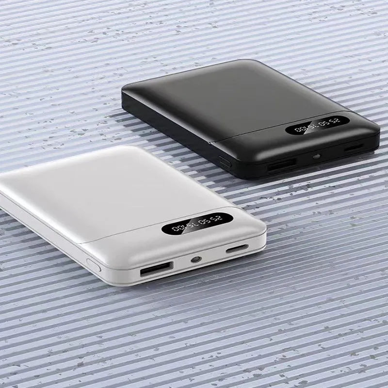 Black or white portable power bank with multi-USB ports, showing 10000mAh 4000mAh 5000mAh 6000mAh capacity options.