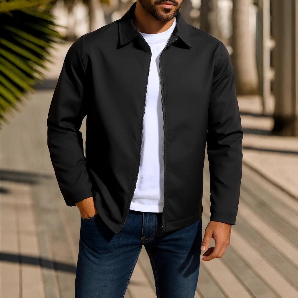 Man wearing a green zip-up cardigan jacket with raglan sleeves on a casual day out.