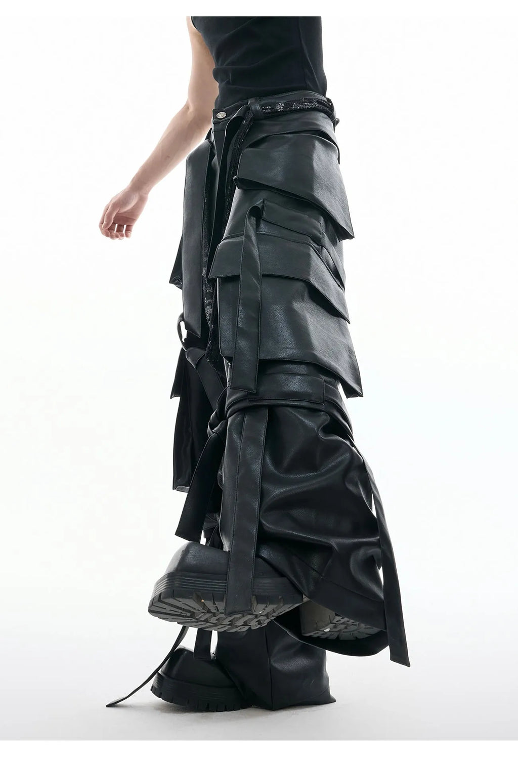 Black quilted loose-fit trousers with multiple pockets and leather-like appearance