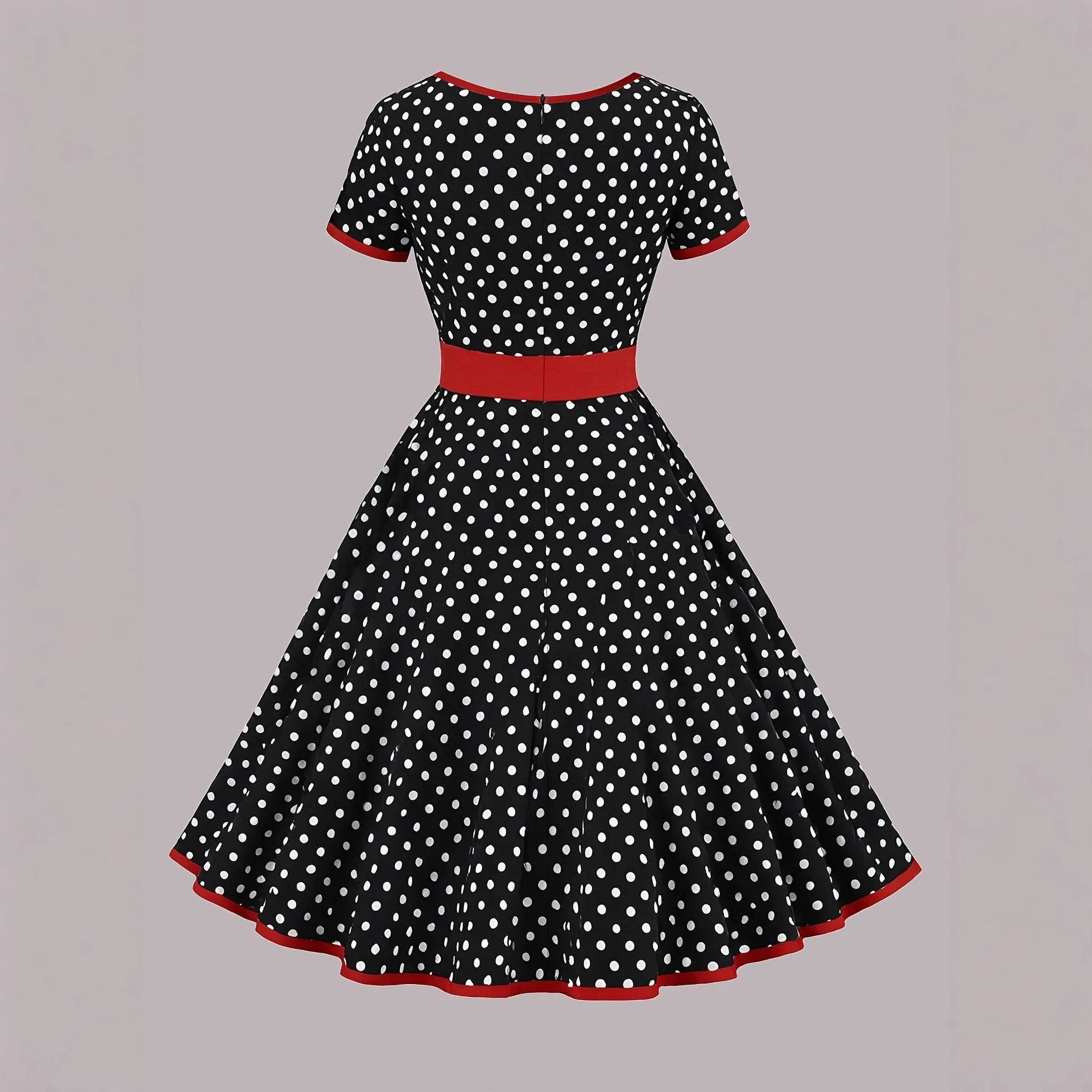 Multicolour polka dot pleated dress with square collar and short sleeves on a hanger.