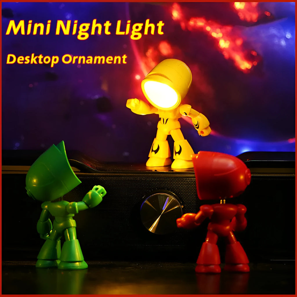 Mini LED hero robot night light with warm glow, adjustable arms, and 360-degree rotating head on a wooden shelf