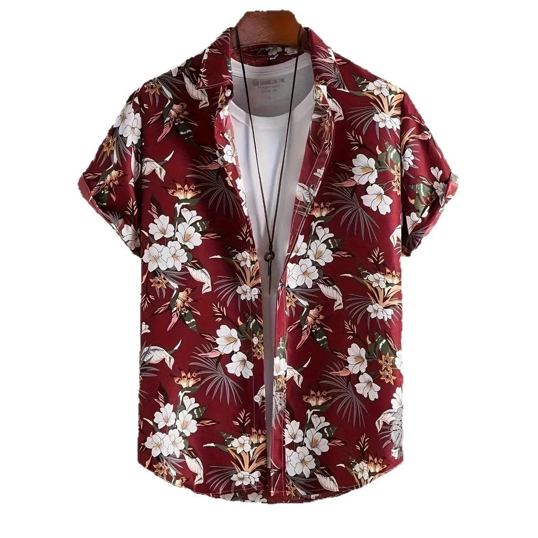 Man wearing a loose-fit floral print short sleeve cardigan-style shirt.