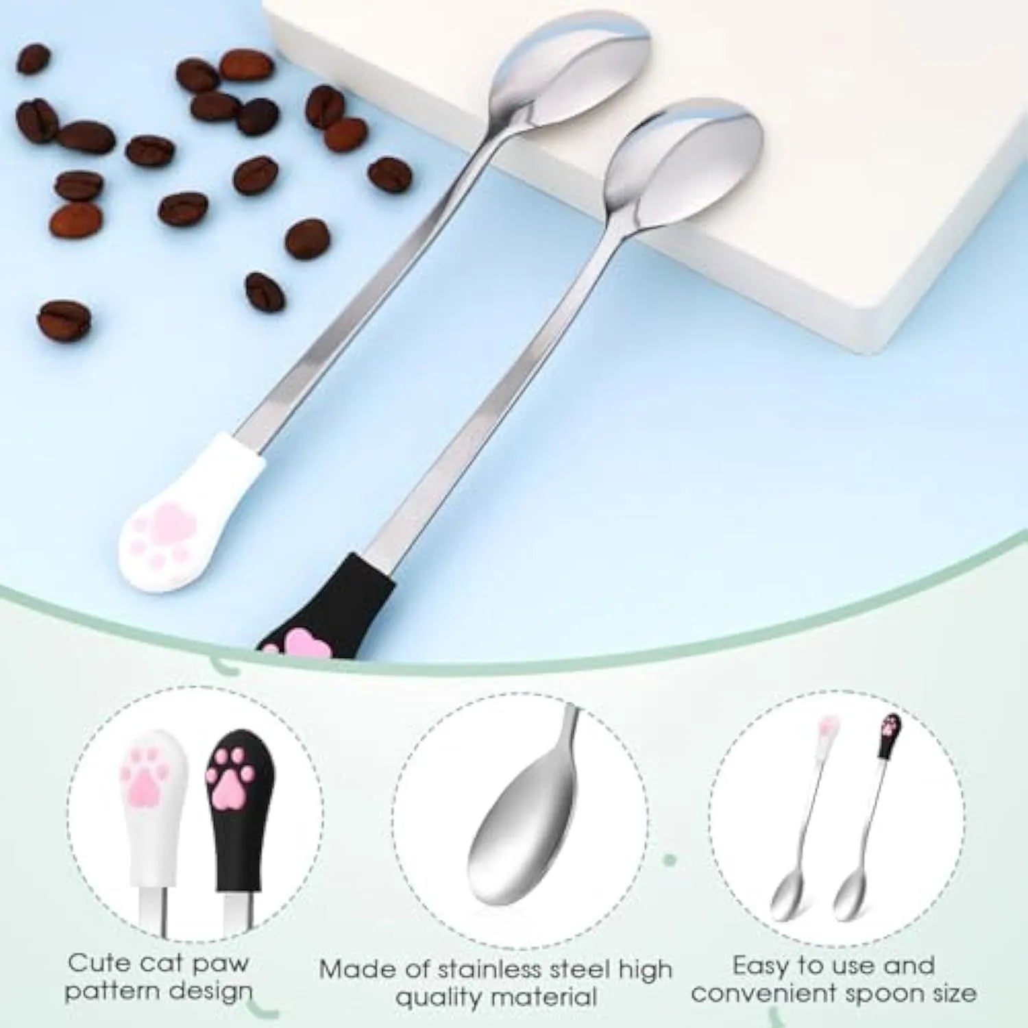 White and black pet food spoons with cat paw prints and silicone grips