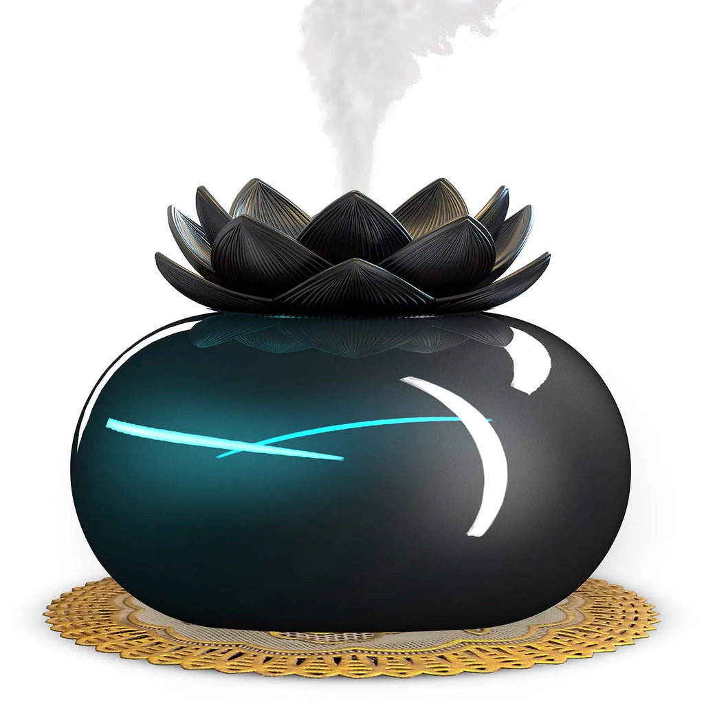 Pure black lotus-shaped USB aromatherapy humidifier with ceramic bowl on a table