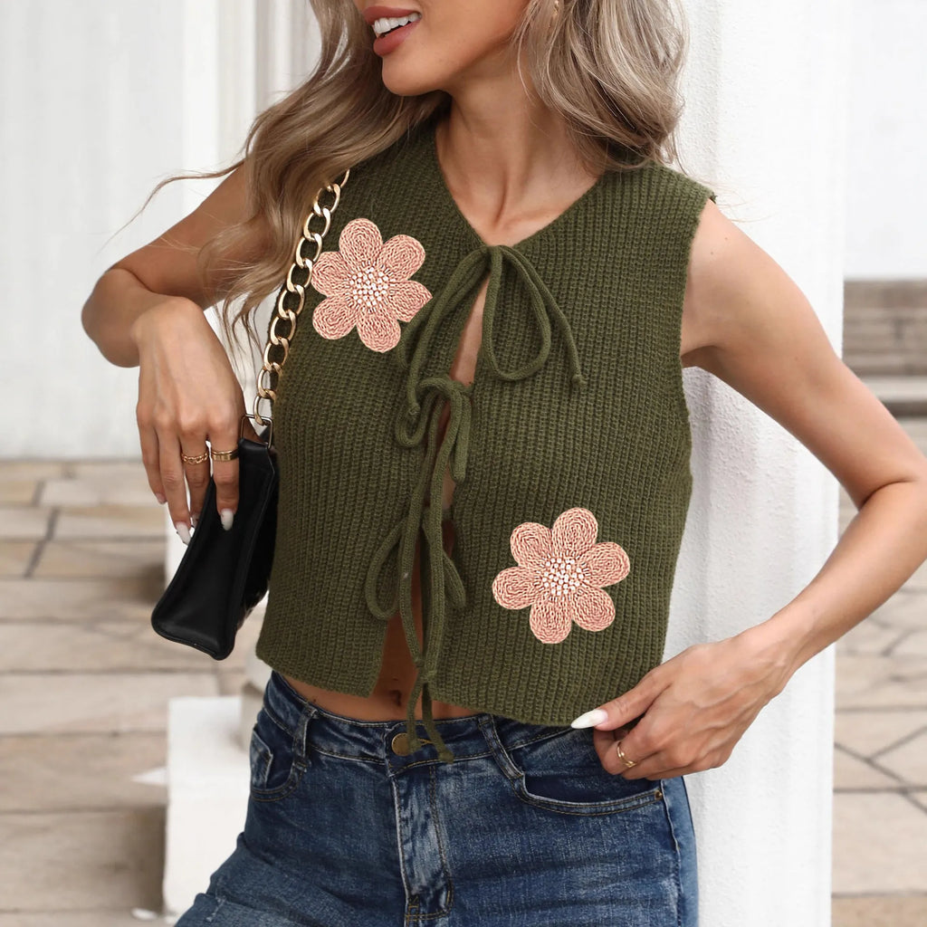 Women's army green sleeveless lace-up cardigan vest with bow detail and apricot flower accents.