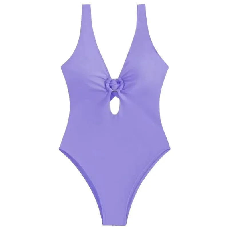 Women's solid colour one-piece swimsuit in polyester fabric showing available colour options