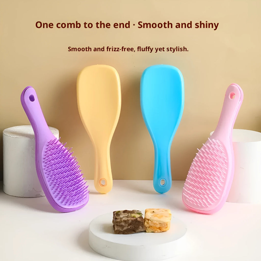 TT Air Curling Massage Home Princess Comb in pink, a plastic air-cushion hairbrush with massage tips