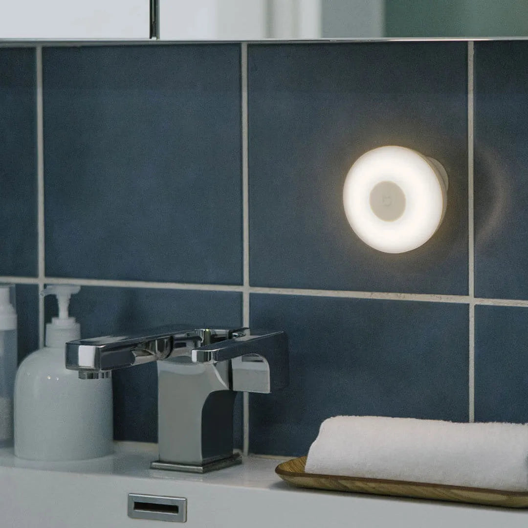 White Mijia Night Light 2 Bluetooth bedside lamp with human body induction sensor.