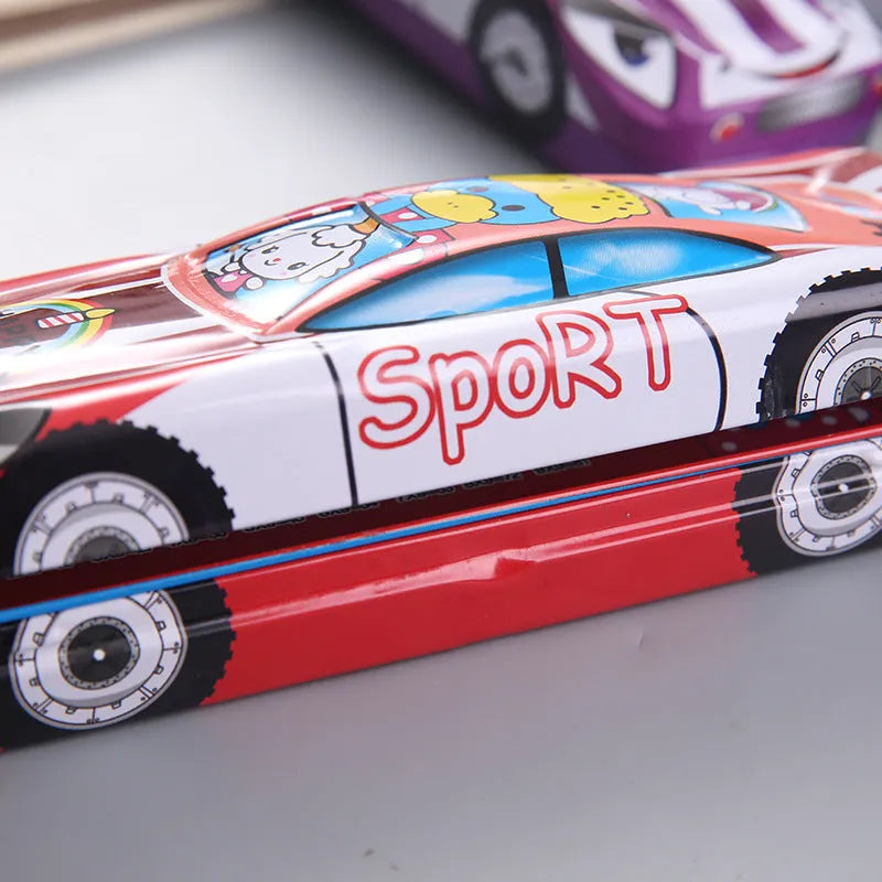 Tinplate racing car shaped double-layer stationery box pencil case with cartoon patterns