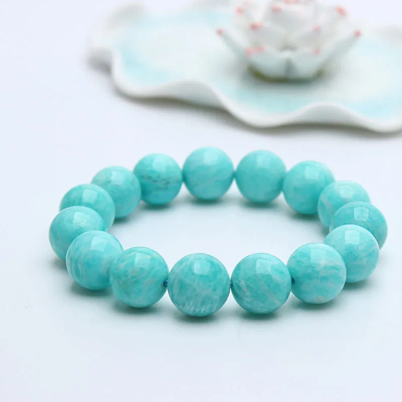 Amazonite gemstone bracelet with polished blue-green beads, shown in 8mm, 9mm, and 10mm size options.