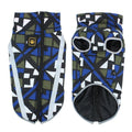 A thick reflective dog jacket in a geometric blue colour, shown on a large breed dog.