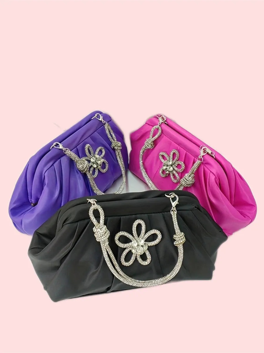 Women's soft polyester dinner messenger bag in lavender purple showing fold, diamond, and chain details.