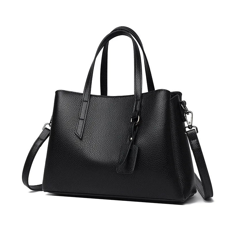 Cowhide leather women's shoulder handbag in khaki with multiple compartments and business styling