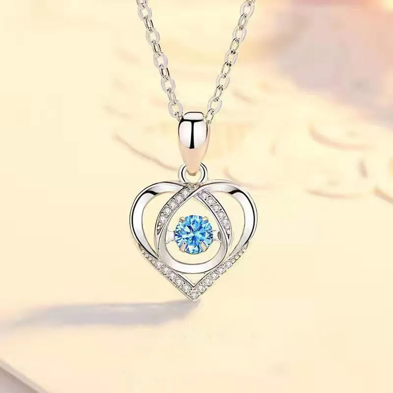 Blue beating heart necklace and bracelet set with mixed gem inlay on electroplated copper