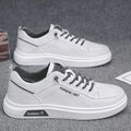 Men's grey canvas flats shoes with front lace-up stitching and shallow mouth design, side view